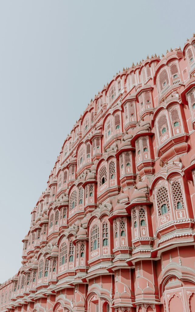 The pink sandstone façade of Hawa Mahal in Jaipur